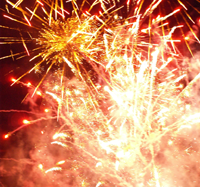 Brightly coloured fireworks fill the sky at Drumnadrochit